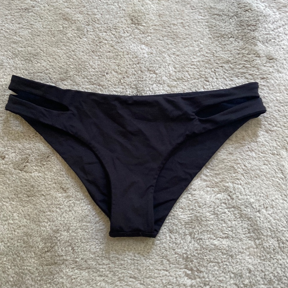 L Space black cutout bottoms